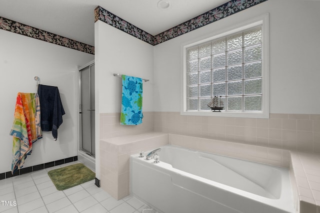 bathroom with plus walk in shower and tile patterned floors