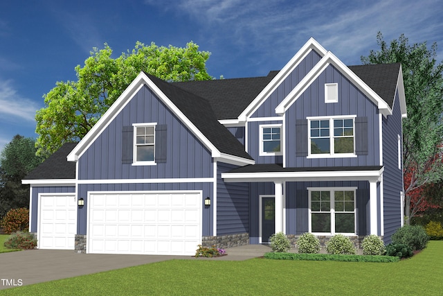 view of front facade featuring a front yard and a garage