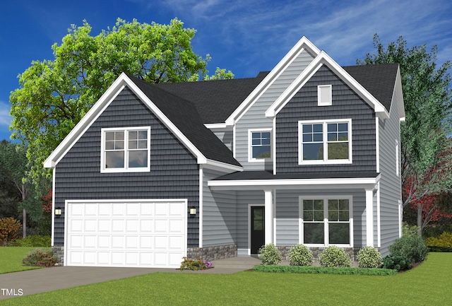 view of front of home featuring a front yard and a garage