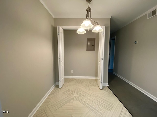 interior space with a notable chandelier, electric panel, and ornamental molding