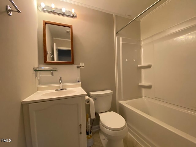 full bathroom with vanity, bathing tub / shower combination, toilet, and crown molding