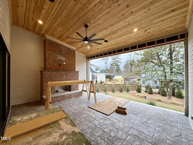 view of patio featuring ceiling fan