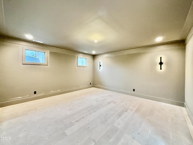 basement with wood-type flooring