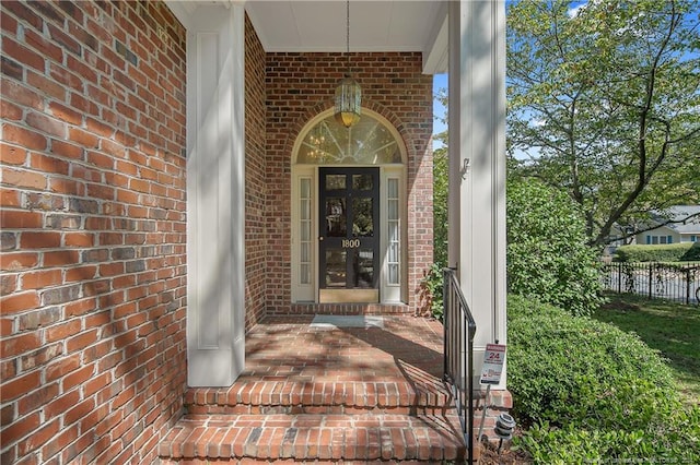 doorway to property featuring a porch