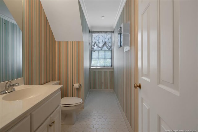 bathroom with ornamental molding, tile patterned flooring, vanity, and toilet