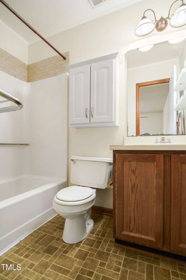 full bathroom with  shower combination, vanity, toilet, and ornamental molding