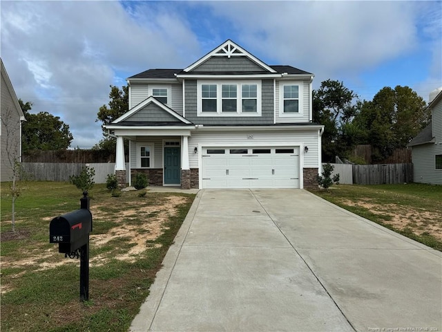 craftsman-style home featuring a garage, a porch, and a front lawn