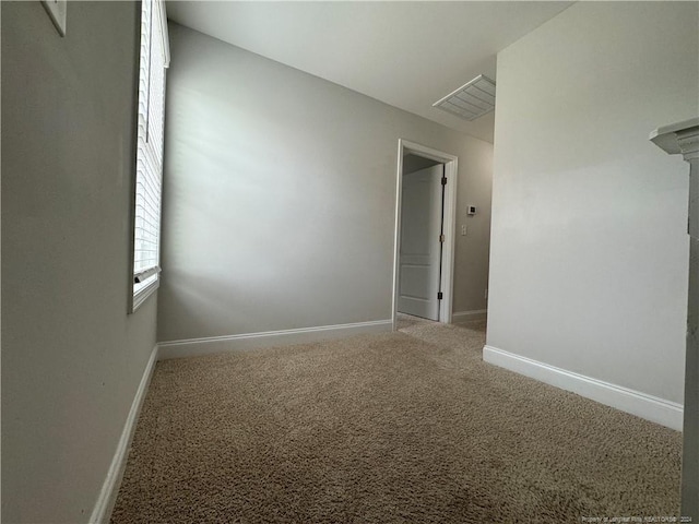 view of carpeted spare room