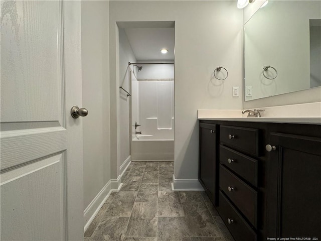 bathroom featuring vanity and bathtub / shower combination