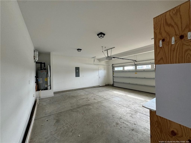 garage with a garage door opener, electric panel, and electric water heater