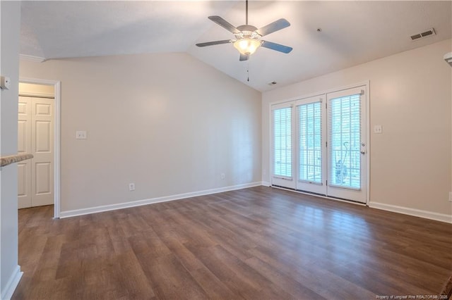 unfurnished room featuring ceiling fan, baseboards, lofted ceiling, visible vents, and dark wood-style floors