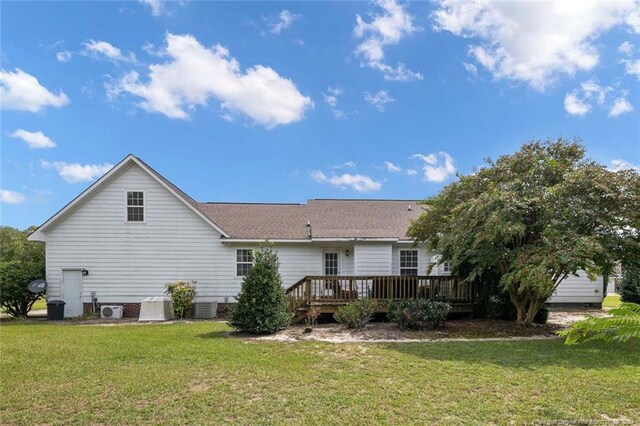 back of house with a lawn, central AC, and a wooden deck