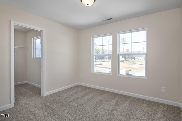 view of carpeted spare room