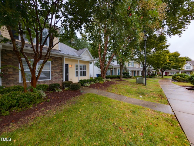 view of front of home with a front yard