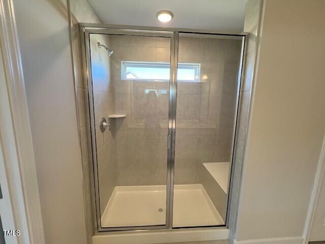 full bath featuring a stall shower