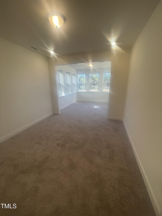 empty room with carpet floors