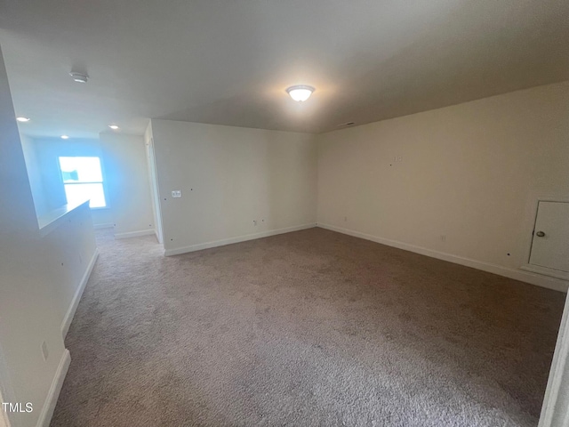 spare room with carpet floors