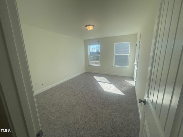 view of carpeted spare room