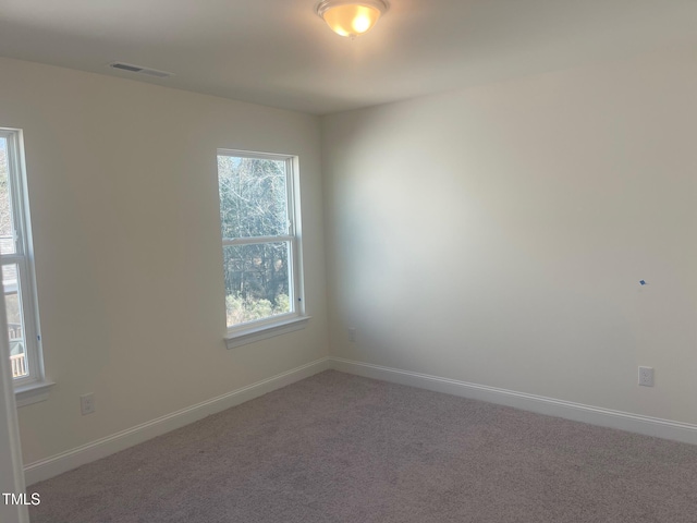 empty room with carpet floors