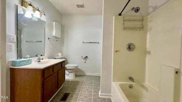 full bathroom with tile patterned flooring, bathing tub / shower combination, vanity, and toilet