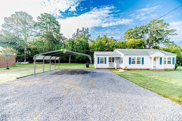 single story home with a carport and a front lawn