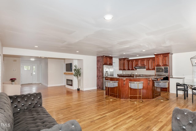 living room featuring light wood-type flooring