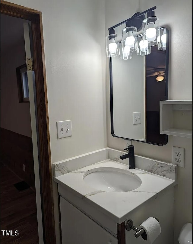 half bath with toilet and vanity