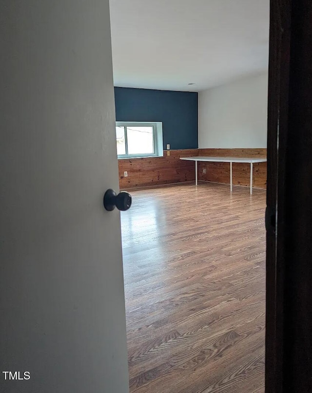 empty room featuring wood finished floors