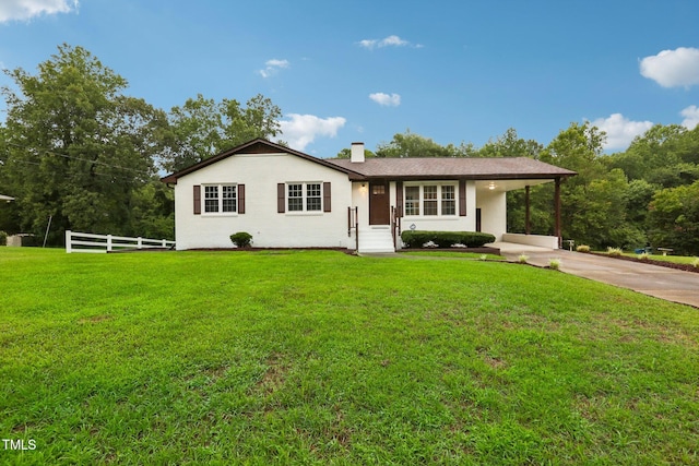 view of front facade with a front lawn