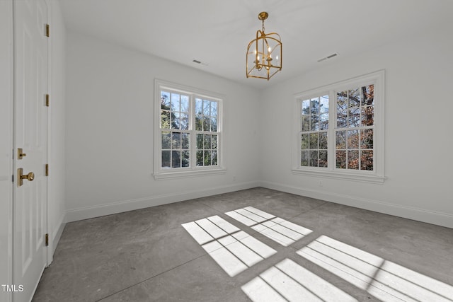 unfurnished dining area with baseboards, concrete floors, visible vents, and a notable chandelier