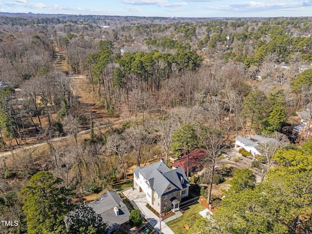 aerial view featuring a forest view