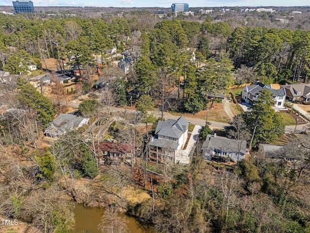 bird's eye view featuring a forest view