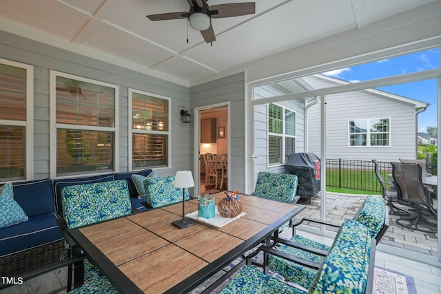 view of patio / terrace featuring grilling area, an outdoor hangout area, and ceiling fan