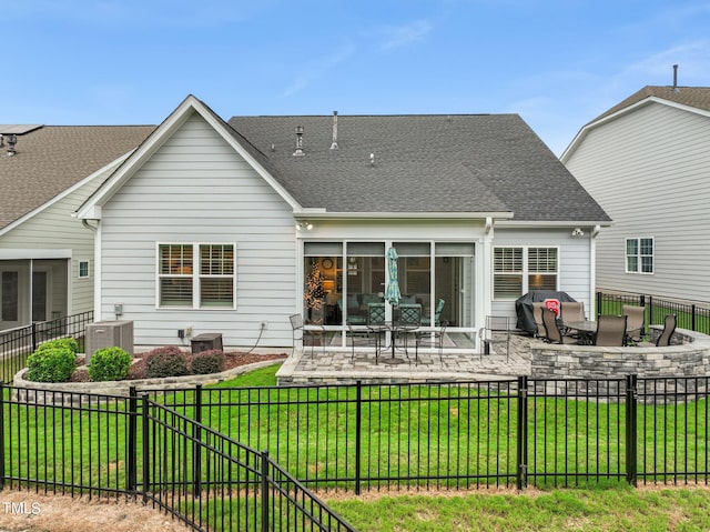 back of property featuring a patio, a yard, and cooling unit