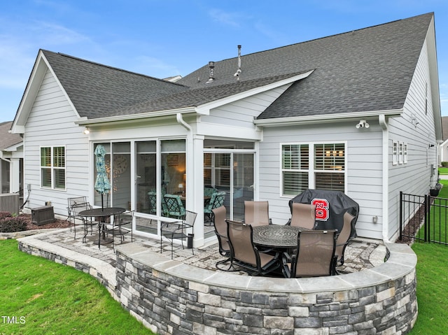 rear view of property with a patio area