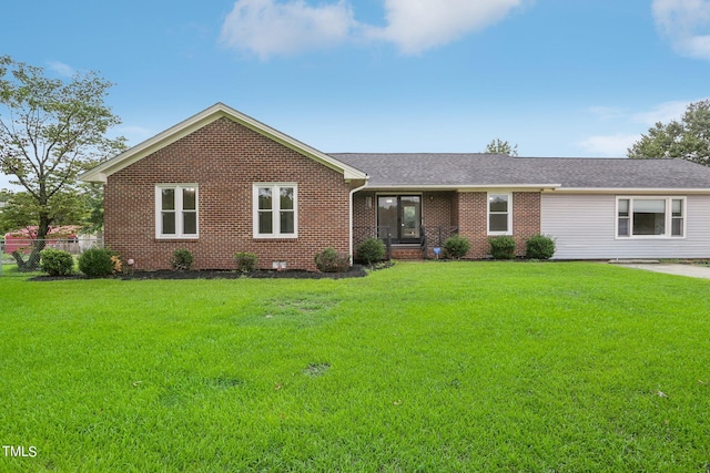 single story home with a front lawn