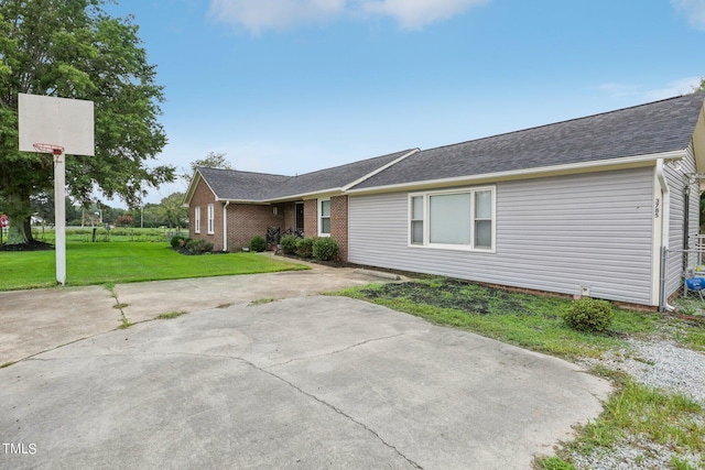 exterior space with a front yard