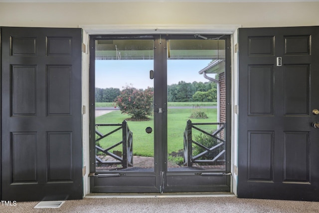 entryway with light carpet