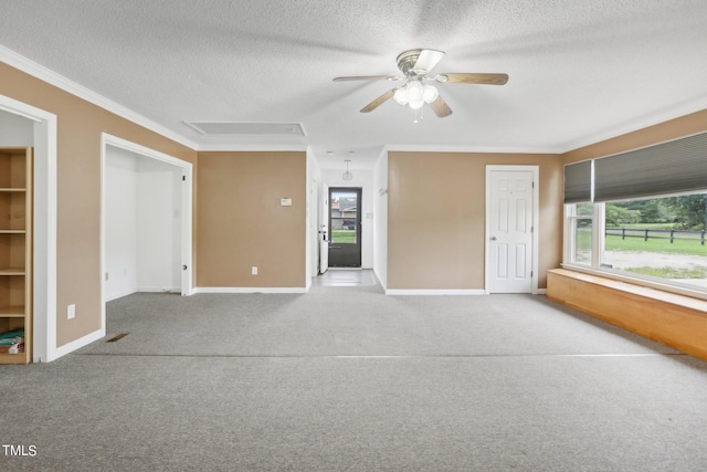 interior space featuring a textured ceiling, light carpet, and ceiling fan