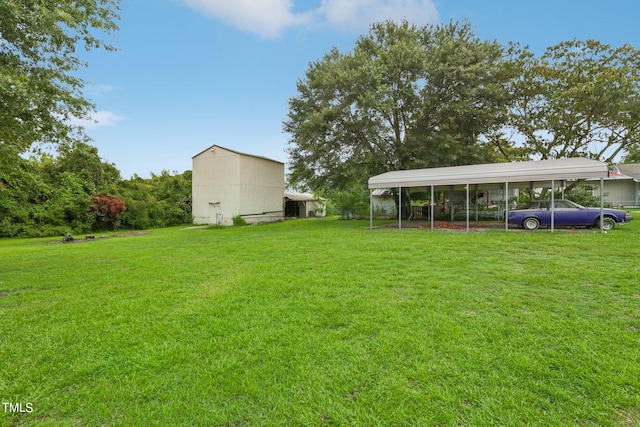 view of yard with a carport