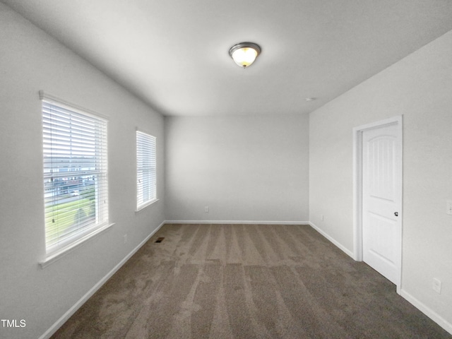 view of carpeted spare room