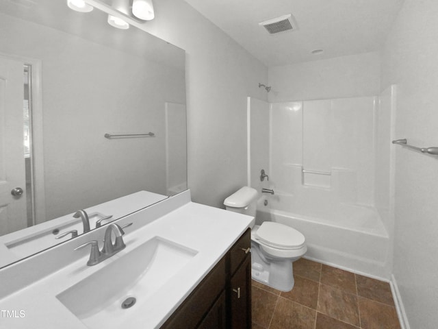 full bathroom with vanity, toilet, and bathtub / shower combination