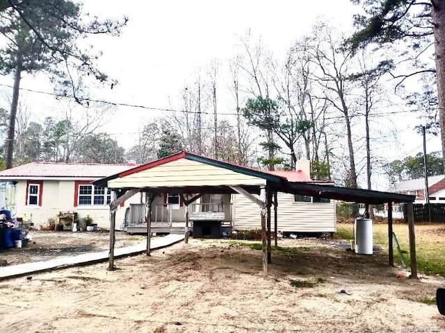 view of front of house featuring a carport