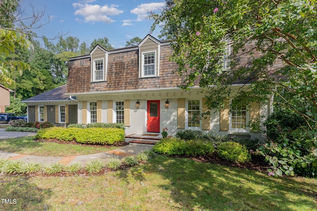 view of front of home with a front yard