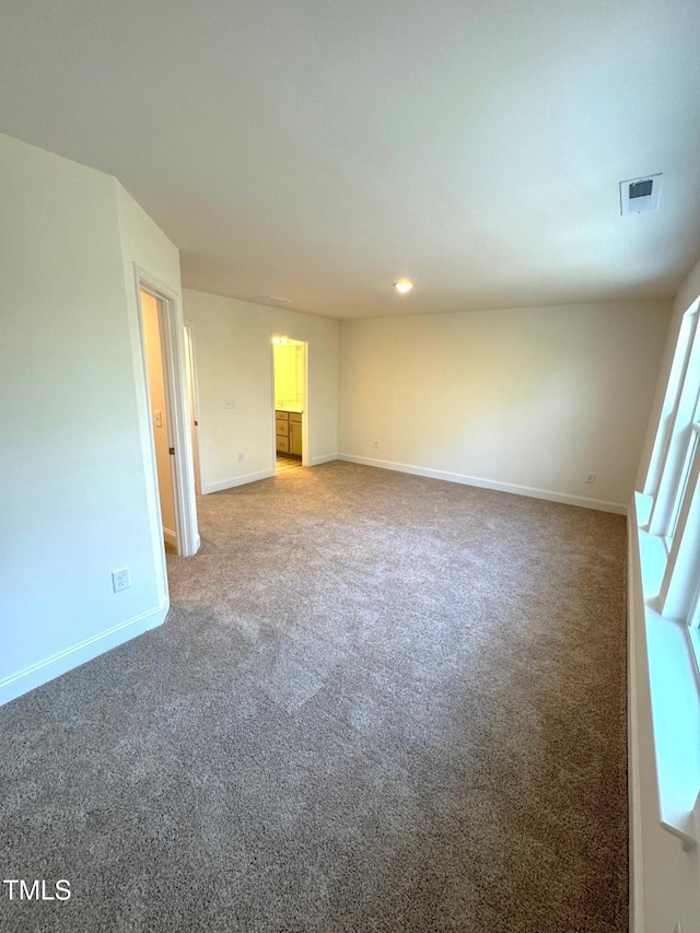 spare room with carpet