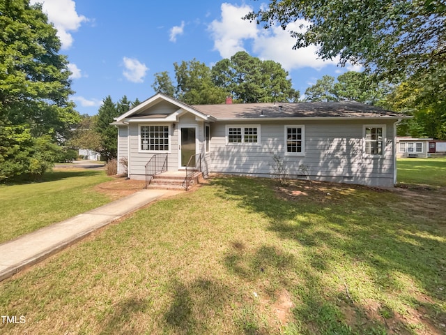 view of front of house with a front yard