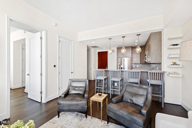 living room featuring dark wood-type flooring