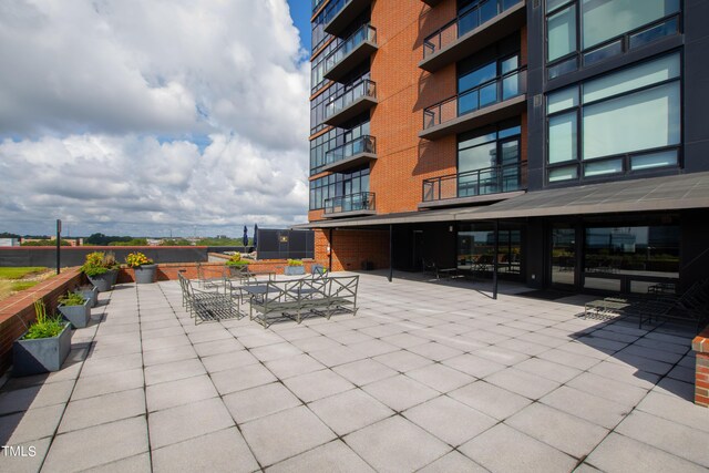 view of patio with a balcony