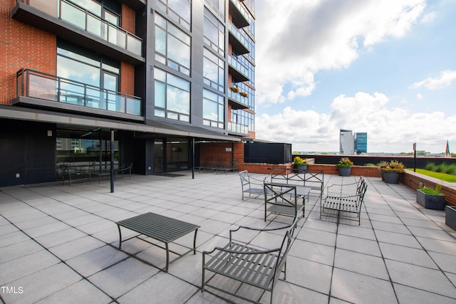 view of patio / terrace featuring a balcony