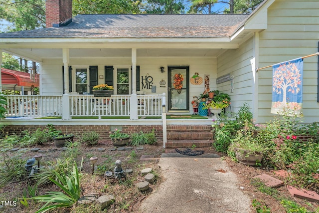 property entrance featuring covered porch